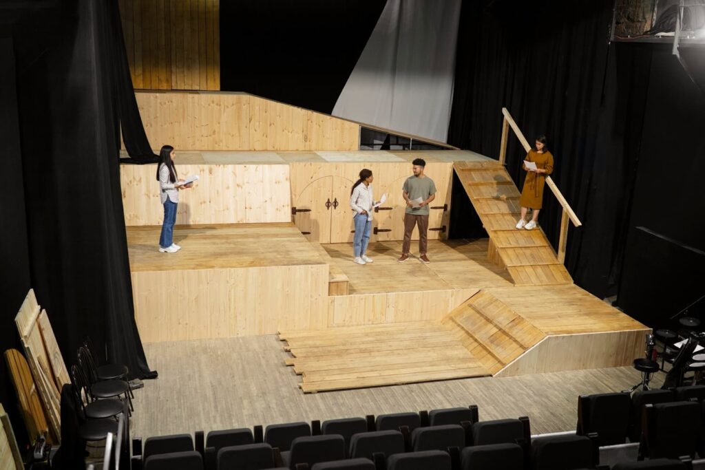 A group of people setting a stage